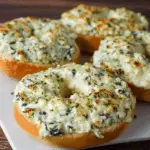 Cheesy Spinach-Artichoke Bagels